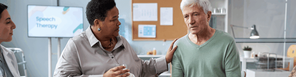 Senior white haired man sharing feelings in mental health support group