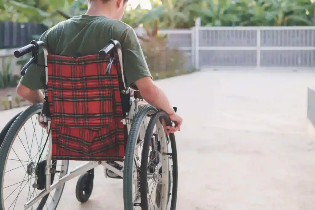 Manual wheelchair use training for the person with disability.