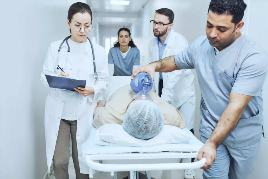 Patient surrounded by doctors in a hospital
